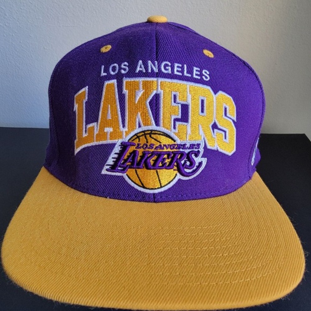 Los Angeles Lakers Mitchell & Ness SnapBack Hat Purple / Yellow Spellout Logo